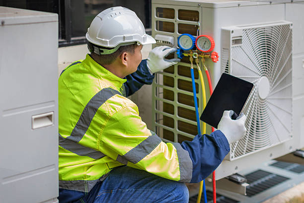 Professional Air Duct Cleaning technician working in Glenarm, IL